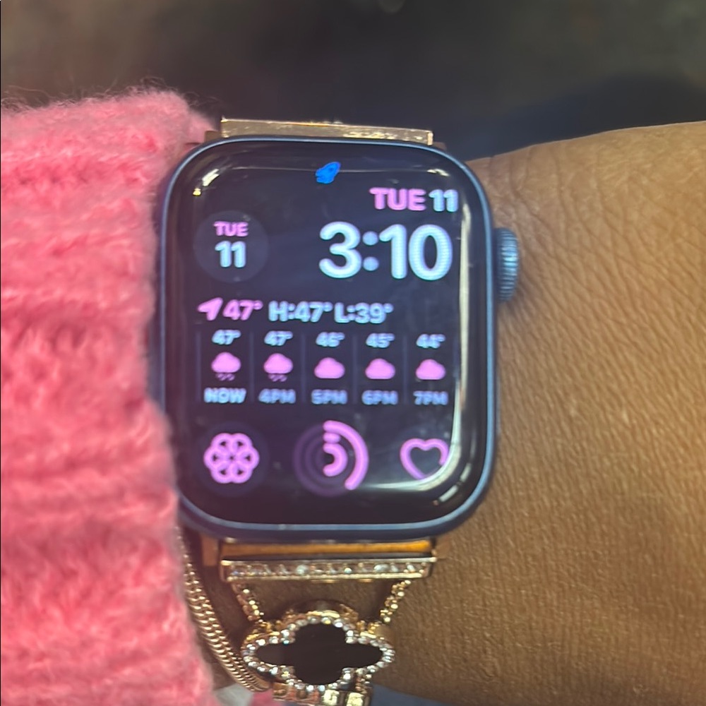 Gold and Black Smartwatch with Rectangular Display and Weather Updates